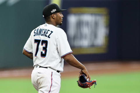 HOUSTON, TEXAS – OCTOBER 08: Sixto Sanchez #73 of the Miami Marlins reacts after loading the bases during the second inning against the Atlanta Braves in Game Three of the National League Division Series at Minute Maid Park on October 08, 2020 in Houston, Texas. (Photo by Elsa/Getty Images)