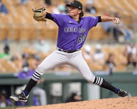 GLENDALE, ARIZONA – MARCH 07: Ryan Rolison #80 of the Colorado Rockies pitches against the Chicago White Sox on March 7, 2021 at Camelback Ranch in Glendale Arizona. (Photo by Ron Vesely/Getty Images)