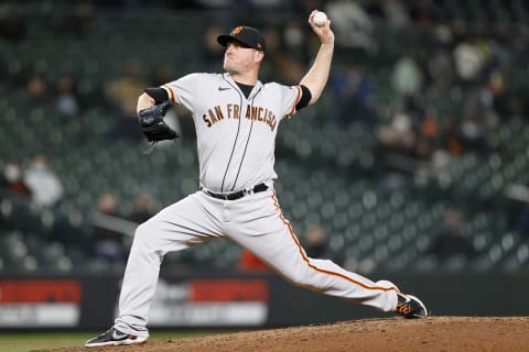 SEATTLE, WASHINGTON – APRIL 02: Jake McGee #17 of the San Francisco Giants pitches in the ninth inning against the Seattle Mariners at T-Mobile Park on April 02, 2021 in Seattle, Washington. (Photo by Steph Chambers/Getty Images)