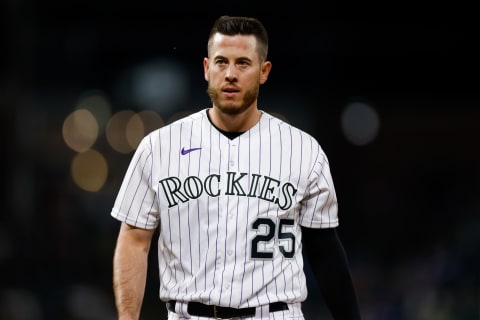 DENVER, CO – APRIL 2: C.J. Cron #25 of the Colorado Rockies walks off the field after the fifth inning against the Los Angeles Dodgers at Coors Field on April 2, 2021 in Denver, Colorado. (Photo by Justin Edmonds/Getty Images)