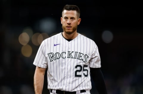 DENVER, CO – APRIL 2: C.J. Cron #25 of the Colorado Rockies walks off the field after the fifth inning against the Los Angeles Dodgers at Coors Field on April 2, 2021 in Denver, Colorado. (Photo by Justin Edmonds/Getty Images)