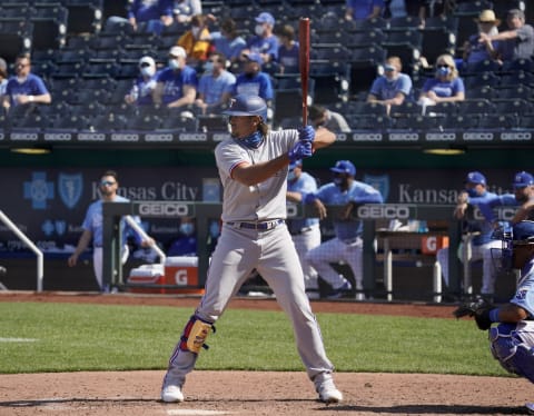 KANSAS CITY, MISSOURI – APRIL 3: Ronald Guzman #11 of the Texas Rangers bats in the eight inning Kansas City Royals at Kauffman Stadium on April 3, 2020 in Kansas City, Missouri. (Photo by Ed Zurga/Getty Images)