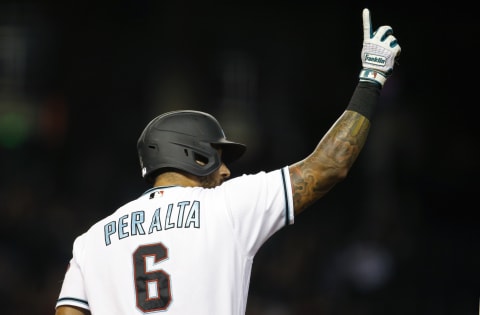 PHOENIX, ARIZONA – APRIL 30: David Peralta #6 of the Arizona Diamondbacks gestures to the crowd after hitting an RBI single against the Colorado Rockies during the third inning of the MLB game at Chase Field on April 30, 2021 in Phoenix, Arizona. (Photo by Ralph Freso/Getty Images)