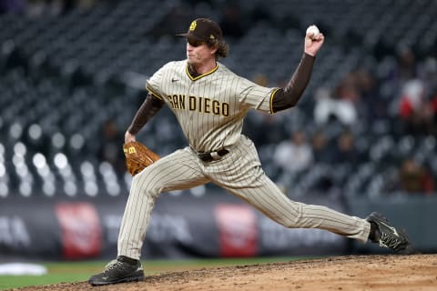 DENVER, COLORADO – MAY 11: Picher Tim Hill #25 of the San Diego Padres throws against the Colorado Rockies in the ninth inning at Coors Field on May 11, 2021 in Denver, Colorado. (Photo by Matthew Stockman/Getty Images)