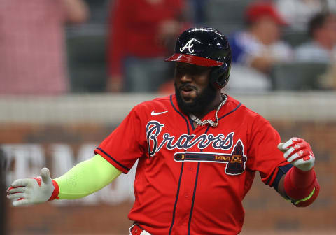 ATLANTA, GEORGIA – MAY 21: Marcell Ozuna #20 of the Atlanta Braves reacts after hitting a solo homer in the sixth inning against the Pittsburgh Pirates at Truist Park on May 21, 2021 in Atlanta, Georgia. (Photo by Kevin C. Cox/Getty Images)