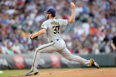 DENVER, COLORADO – JUNE 19: Starting pitcher Adrian Houser #37 of the Milwaukee Brewers throws against the Colorado Rockies in the first inning at Coors Field on June 19, 2021 in Denver, Colorado. (Photo by Matthew Stockman/Getty Images)