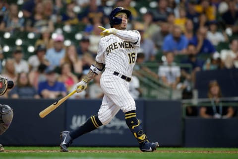 MILWAUKEE, WISCONSIN – JUNE 25: Kolten Wong #16 of the Milwaukee Brewers swings at a pitch against the Colorado Rockies at American Family Field on June 25, 2021 in Milwaukee, Wisconsin. Brewers defeated the Rockies 5-4. (Photo by John Fisher/Getty Images)