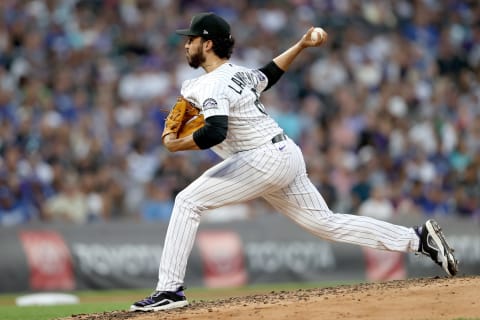 DENVER, COLORADO – JULY 16: Pitcher Justin Lawrence #61 of the Colorado Rockies throws against the Los Angeles Dodgers in the fifth inning at Coors Field on July 16, 2021 in Denver, Colorado. (Photo by Matthew Stockman/Getty Images)