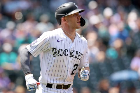 DENVER, COLORADO – JULY 21: Trevor Story #27 of the Colorado Rockies runs to first after hitting a single against the Seattle Mariners in the first inning at Coors Field on July 21, 2021 in Denver, Colorado. (Photo by Matthew Stockman/Getty Images)