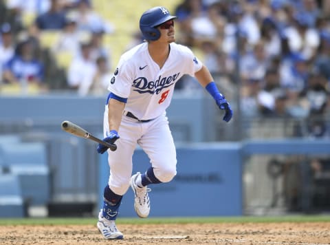 LOS ANGELES, CA – JULY 25: Zach McKinstry #8 of the Los Angeles Dodgers flies out while playing the Colorado Rockies at Dodger Stadium on July 25, 2021 in Los Angeles, California. (Photo by John McCoy/Getty Images)