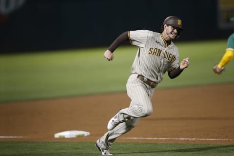 OAKLAND, CA – AUGUST 3: Jake Marisnick #16 of the San Diego Padres runs the bases during the game against the Oakland Athletics at RingCentral Coliseum on August 3, 2021 in Oakland, California. The Padres defeated the Athletics 8-1. (Photo by Michael Zagaris/Oakland Athletics/Getty Images)