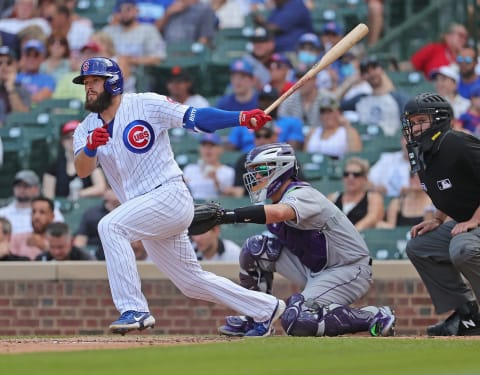 CHICAGO, ILLINOIS – AUGUST 25: David Bote #13 of the Chicago Cubs bats against the Colorado Rockies at Wrigley Field on August 25, 2021 in Chicago, Illinois. The Cubs defeated the Rockies 5-2. (Photo by Jonathan Daniel/Getty Images)