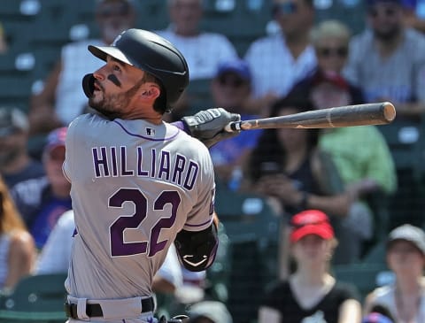 CHICAGO, ILLINOIS – AUGUST 25: Sam Hilliard #22 of the Colorado Rockies bats against the Chicago Cubs at Wrigley Field on August 25, 2021 in Chicago, Illinois. The Cubs defeated the Rockies 5-2. (Photo by Jonathan Daniel/Getty Images)