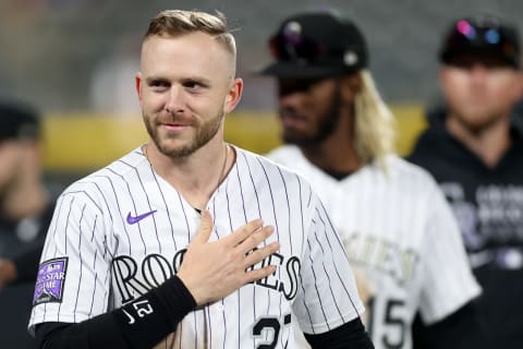 DENVER, COLORADO – SEPTEMBER 29: Trevor Story #27 of the Colorado Rockies acknowledges the crowd as the team walks around the warning track after their final home game and win over the Washington Nationals at Coors Field on September 29, 2021 in Denver, Colorado. (Photo by Matthew Stockman/Getty Images)