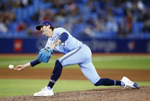 TORONTO, ON – SEPTEMBER 29: Adam Cimber #90 of the Toronto Blue Jays delivers a pitch during a MLB game against the New York Yankees at Rogers Centre on September 29, 2021 in Toronto, Ontario, Canada. (Photo by Vaughn Ridley/Getty Images)