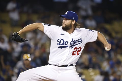 LOS ANGELES, CALIFORNIA – OCTOBER 01: Clayton Kershaw #22 of the Los Angeles Dodgers pitches against the Milwaukee Brewers during the first inning at Dodger Stadium on October 01, 2021 in Los Angeles, California. (Photo by Michael Owens/Getty Images)