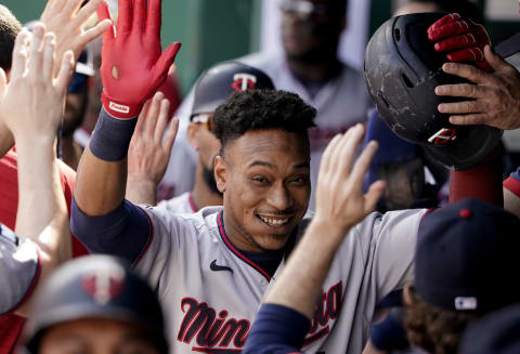 KANSAS CITY, MISSOURI – OCTOBER 03: Jorge Polanco #11 of the Minnesota Twins celebrates his three-run home run with teammates in the first inning against the Kansas City Royals at Kauffman Stadium on October 03, 2021 in Kansas City, Missouri. (Photo by Ed Zurga/Getty Images)