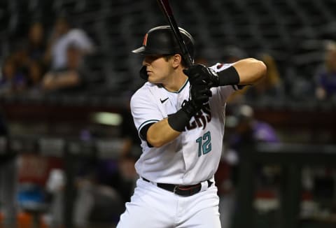 PHOENIX, ARIZONA – OCTOBER 01: Daulton Varsho #12 of the Arizona Diamondbacks gets ready in the batters box against the Colorado Rockies at Chase Field on October 01, 2021 in Phoenix, Arizona. (Photo by Norm Hall/Getty Images)