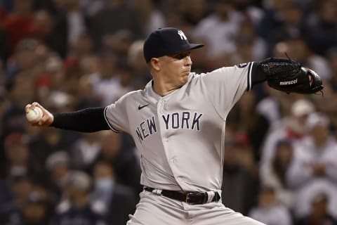 BOSTON, MASSACHUSETTS – OCTOBER 05: Chad Green #57 of the New York Yankees pitches against the Boston Red Sox during the seventh inning of the American League Wild Card game at Fenway Park on October 05, 2021 in Boston, Massachusetts. (Photo by Winslow Townson/Getty Images)