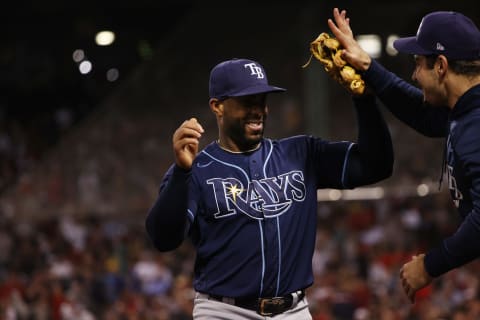 BOSTON, MASSACHUSETTS – OCTOBER 11: Yandy Diaz #2 of the Tampa Bay Rays celebrates after throwing out a runner in the sixth inning against the Boston Red Sox during Game 4 of the American League Division Series at Fenway Park on October 11, 2021 in Boston, Massachusetts. (Photo by Winslow Townson/Getty Images)