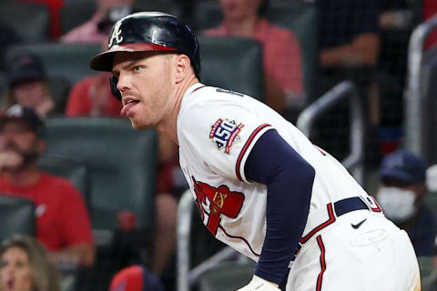 ATLANTA, GEORGIA – OCTOBER 12: Freddie Freeman #5 of the Atlanta Braves singles during the fifth inning against the Milwaukee Brewers in game four of the National League Division Series at Truist Park on October 12, 2021 in Atlanta, Georgia. (Photo by Kevin C. Cox/Getty Images)