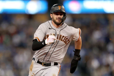 LOS ANGELES, CALIFORNIA – OCTOBER 12: Kris Bryant #23 of the San Francisco Giants runs to third base against the Los Angeles Dodgers second inning in game 4 of the National League Division Series at Dodger Stadium on October 12, 2021 in Los Angeles, California. (Photo by Ronald Martinez/Getty Images)