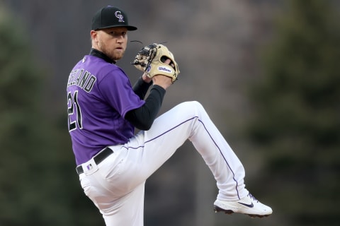 DENVER, COLORADO – APRIL 14: Starting pitcher Kyle Freeland #21 of the Colorado Rockies throws against the Chicago Cubs in the first inning at Coors Field on April 14, 2022 in Denver, Colorado. (Photo by Matthew Stockman/Getty Images)