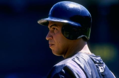 14 Jun 1997: First baseman Andres Galarraga of the Colorado Rockies looks on during their game against the Oakland Athletics at the Oakland Coliseum in Oakland, California. The Rockies won their interleague game 7-1.