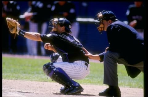 25 Apr 1993: Catcher Joe Girardi of the Colorado Rockies waits to catch the ball during a game against the Florida Marlins at Coors Field in Denver, Colorado. Mandatory Credit: Tim de Frisco /Allsport