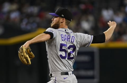 PHOENIX, ARIZONA - JULY 10: Daniel Bard #52 of the Colorado Rockies delivers a ninth inning pitch against the Arizona Diamondbacks at Chase Field on July 10, 2022 in Phoenix, Arizona. Rockies won 3-2. (Photo by Norm Hall/Getty Images)