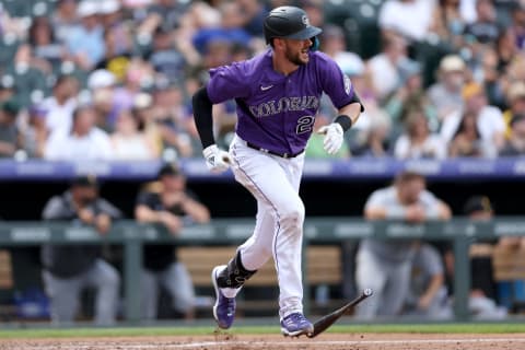 DENVER, COLORADO – JULY 16: Kris Bryant #23 of the Colorado Rockies hits a RBI single against the Pittsburgh Pirates in the fifth inning at Coors Field on July 16, 2022 in Denver, Colorado. (Photo by Matthew Stockman/Getty Images)