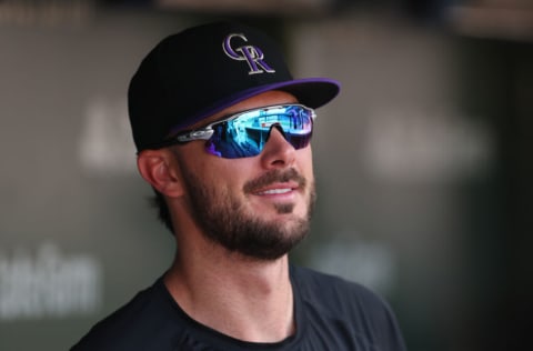 CHICAGO, ILLINOIS - SEPTEMBER 16: Kris Bryant of the Colorado Rockies looks on from the dugout against the Chicago Cubs at Wrigley Field on September 16, 2022 in Chicago, Illinois. (Photo by Michael Reaves/Getty Images)