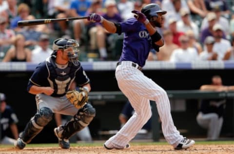 DENVER, CO – AUGUST 15: Dexter Fowler #24 of the Colorado Rockies takes an at bat against the Milwaukee Brewers at Coors Field on August 15, 2012 in Denver, Colorado. The Rockies defeated the Brewers 7-6. (Photo by Doug Pensinger/Getty Images)