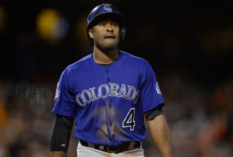 SAN FRANCISCO, CA – APRIL 08: Chris Nelson #4 of the Colorado Rockies walks back to the dugout after striking out against the San Francisco Giants in the ninth inning at AT&T Park on April 8, 2013 in San Francisco, California. (Photo by Thearon W. Henderson/Getty Images)