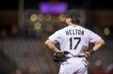 DENVER, CO – AUGUST 30: Todd Helton #17 of the Colorado Rockies stands at first base in the ninth inning of a game against the Cincinnati Reds at Coors Field on August 30, 2013 in Denver, Colorado. The Rockies beat the Reds 9-6. (Photo by Dustin Bradford/Getty Images)