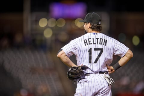 DENVER, CO – AUGUST 30: Todd Helton #17 of the Colorado Rockies stands at first base in the ninth inning of a game against the Cincinnati Reds at Coors Field on August 30, 2013 in Denver, Colorado. The Rockies beat the Reds 9-6. (Photo by Dustin Bradford/Getty Images)