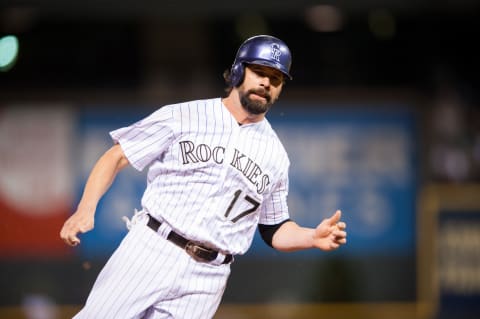 DENVER, CO – SEPTEMBER 18: Todd Helton #17 of the Colorado Rockies rounds third to score in the sixth inning of a game against the St. Louis Cardinals at Coors Field on September 18, 2013 in Denver, Colorado. (Photo by Dustin Bradford/Getty Images)