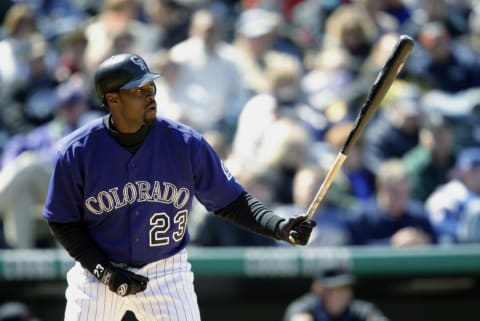 DENVER – APRIL 6: Catcher Charles Johnson #23 of the Colorado Rockies readies for his at bat during the game against the Arizona Diamondbacks at Coors Field on April 6, 2003 in Denver, Colorado. The Rockies defeated the Diamondbacks 8-3. (Photo by Brian Bahr/Getty Images)