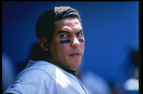 8 Jul 1996: First baseman Andres Galarraga of the Colorado Rockies sits in the dugout during a game against the Los Angeles Dodgers at Dodger Stadium in Los Angeles, California. The Rockies won the game 3-0. Mandatory Credit: Jed Jacobsohn /Allsport