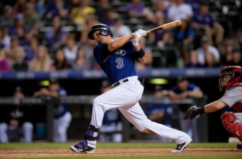 DENVER, CO – AUGUST 17: Michael Cuddyer #3 of the Colorado Rockies hits a solo home run hit in the sixth inning during the second game of a split double header at Coors Field on August 17, 2014 in Denver, Colorado. Cuddyer would complete a cycle during the game. (Photo by Dustin Bradford/Getty Images)