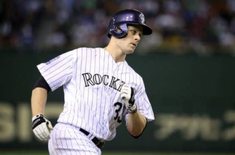 TOKYO, JAPAN – NOVEMBER 16: Justin Morneau #33 of the Colorado Rockies heads home after hitting a three-run homer in the third inning during the game four of Samurai Japan and MLB All Stars at Tokyo Dome on November 16, 2014 in Tokyo, Japan. (Photo by Atsushi Tomura/Getty Images)