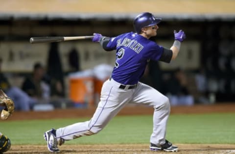 OAKLAND, CA – JUNE 29: Troy Tulowitzki #2 of the Colorado Rockies hit a single against the Oakland Athletics in the top of the eighth inning at O.co Coliseum on June 29, 2015 in Oakland, California. The single was Tulowitzki’s third hit of the game. (Photo by Thearon W. Henderson/Getty Images)