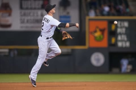 DENVER, CO – JUNE 24: Troy Tulowitzki #2 of the Colorado Rockies makes a play at shortstop against the Arizona Diamondbacks during a game at Coors Field on June 24, 2015, in Denver, Colorado. (Photo by Dustin Bradford/Getty Images)