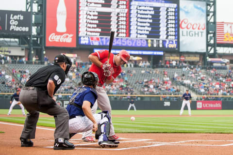 DENVER, CO – JULY 7: Mike Trout #27 of the Los Angeles Angels of Anaheim is hit by a pitch by Chad Bettis #35 of the Colorado Rockies #not pictured in the first inning of a game at Coors Field on July 7, 2015 in Denver, Colorado. (Photo by Dustin Bradford/Getty Images)