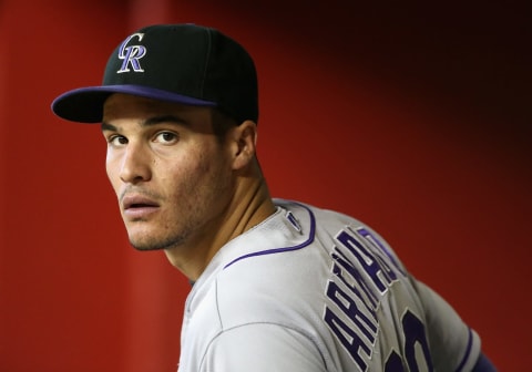 PHOENIX, AZ – APRIL 30: Nolan Arenado #28 of the Colorado Rockies watches from the dugout during the MLB game against the Arizona Diamondbacks at Chase Field on April 30, 2014 in Phoenix, Arizona. (Photo by Christian Petersen/Getty Images)