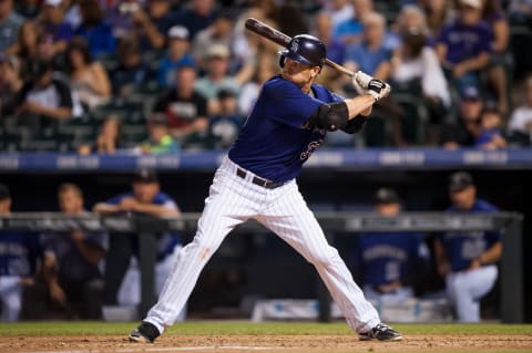 DENVER, CO – SEPTEMBER 25: Justin Morneau #33 of the Colorado Rockies bats against the Los Angeles Dodgers in the third inning of a game at Coors Field on September 25, 2015 in Denver, Colorado. (Photo by Dustin Bradford/Getty Images)