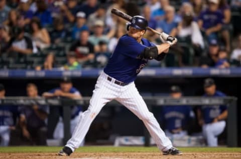 DENVER, CO – SEPTEMBER 25: Justin Morneau #33 of the Colorado Rockies bats at Coors Field on September 25, 2015 in Denver, Colorado. (Photo by Dustin Bradford/Getty Images)