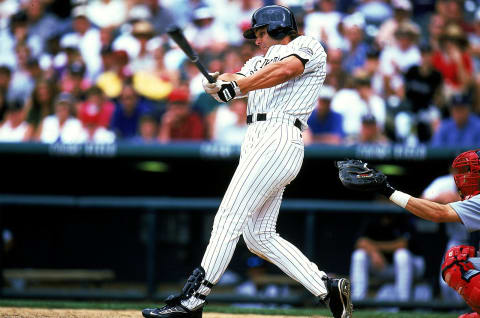 25 Jul 1999: Dante Bichette #10 of the Denver Rockies swings at the ball during the game against the St. Louis Cardinals at the Coors Field in Denver, Colorado. The Cardinals defeated the Rockies 10-6. Mandatory Credit: Jonathan Daniel /Allsport