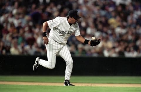 27 Jul 1999: Vinny Castilla #9 of the Colorado Rockies catches the ball during a game against the Houston Astros at the Coors Field in Denver, Colorado. The Astros defeated the Rockies 6-3. Mandatory Credit: Brian Bahr/Allsport