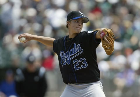 OAKLAND, CA – MAY 22: Pitcher Zack Greinke #23 of the Kansas City Royals delivers against the Oakland Athletics during the game at Network Associates Coliseum on May 22, 2004 in Oakland, California. The Athletics defeated the Royals 4-3 in 11 innings. (Photo by Don Smith/MLB Photos via Getty Images)